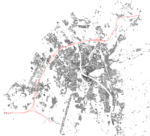 Image 3: Roads classified as Motoways and Motorway Links extracted from the roads dataset in red, surrounded by the buildings layer.